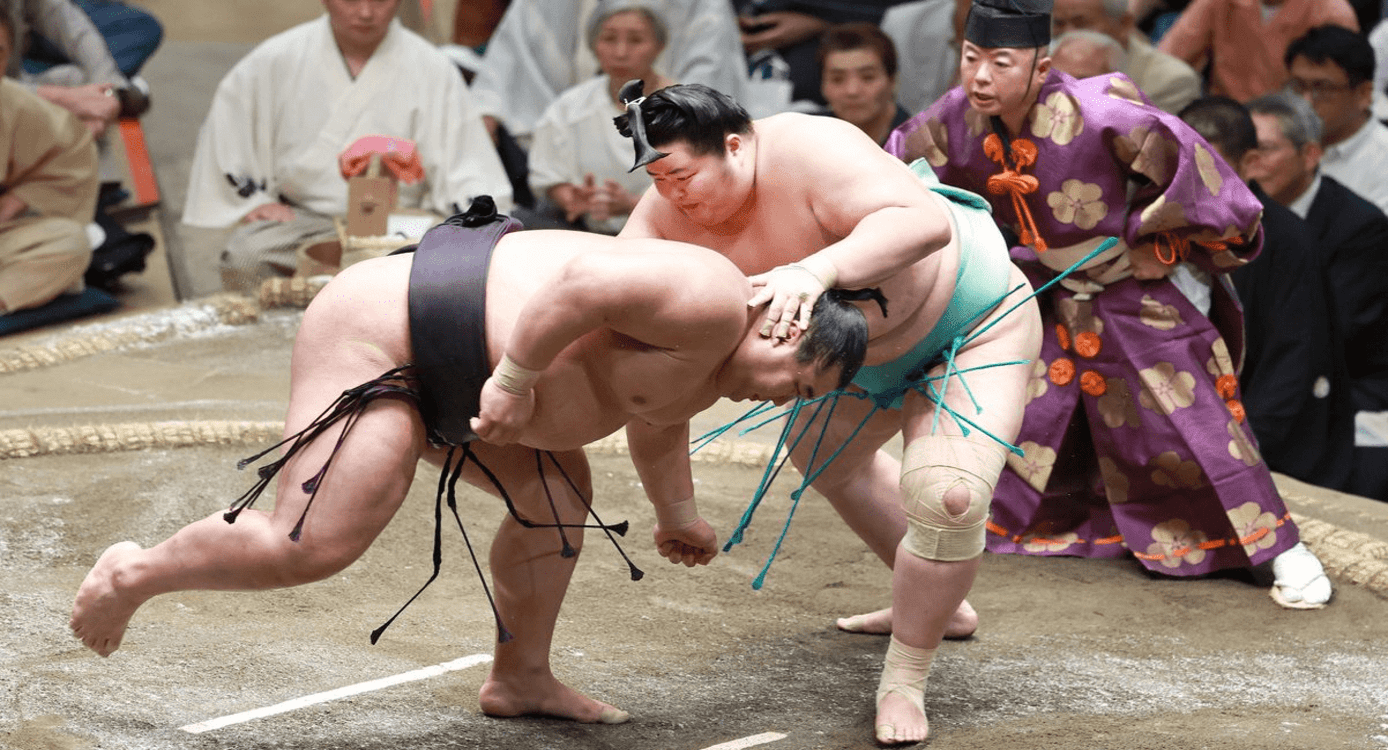 Ozeki Kotozakura Secures Crucial Victory, Ties for Lead in Summer Basho Showdown